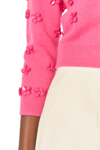 Monique Lhuillier Spring 2025 3/4 sleeve embroidered cashmere crewneck sweater in Hibiscus color - sleeve detail.