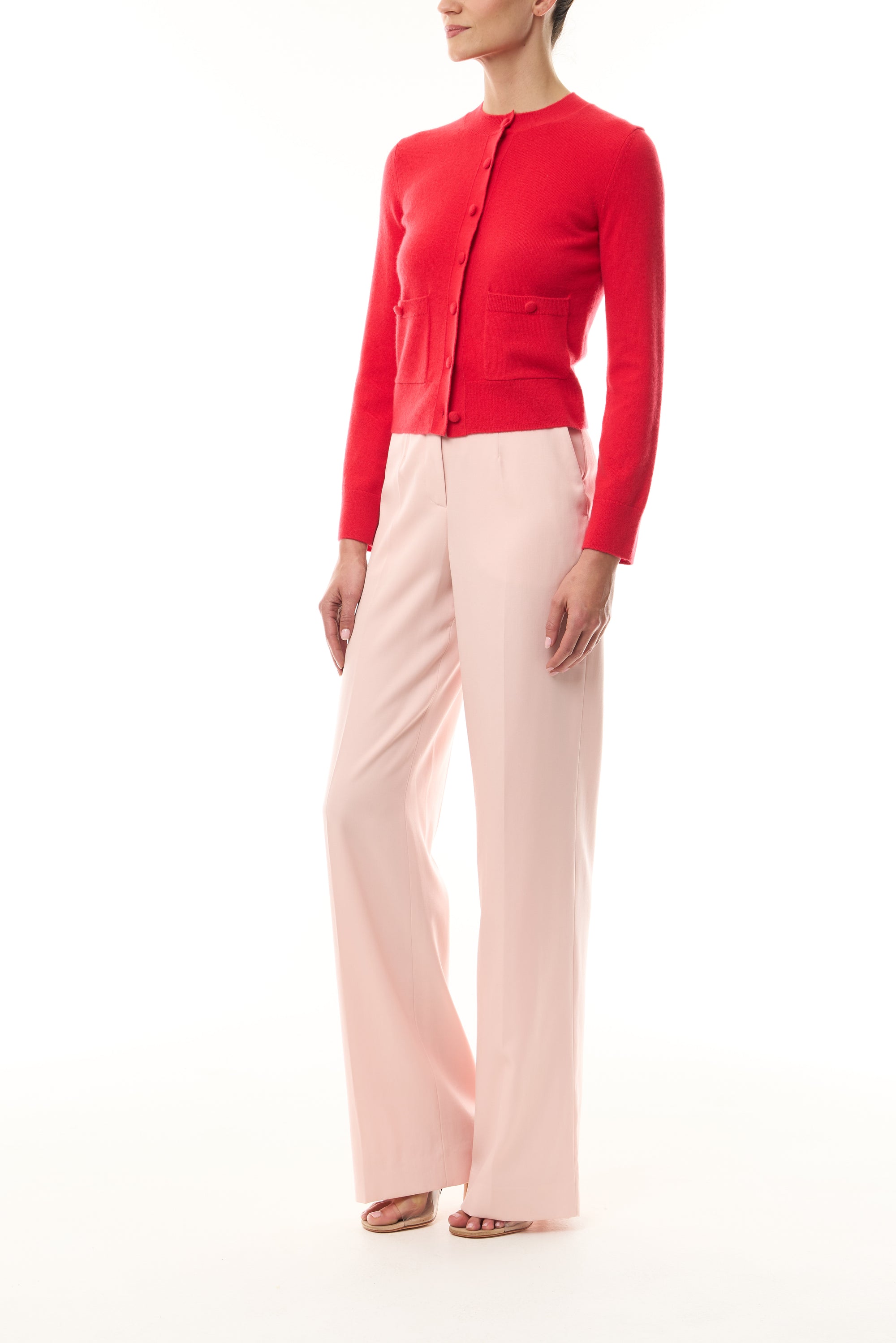 Monique Lhuillier Spring 2026 long sleeve Poppy Cashmere Cardigan with pockets and button front closure- side.