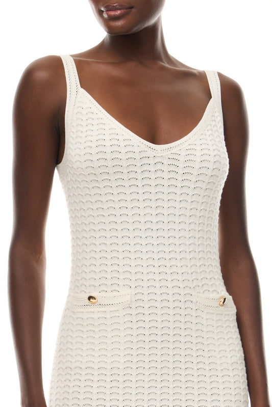 Monique Lhuillier Spring 2026 Ivory Cotton Viscose Knit Lace stitch sleeveless dress with gold buttons - fabric.