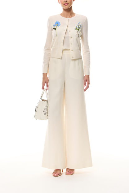 Monique Lhuillier Spring 2026  Ivory Cashmere long sleeve Cardigan with floral embroidery and pockets - front.
