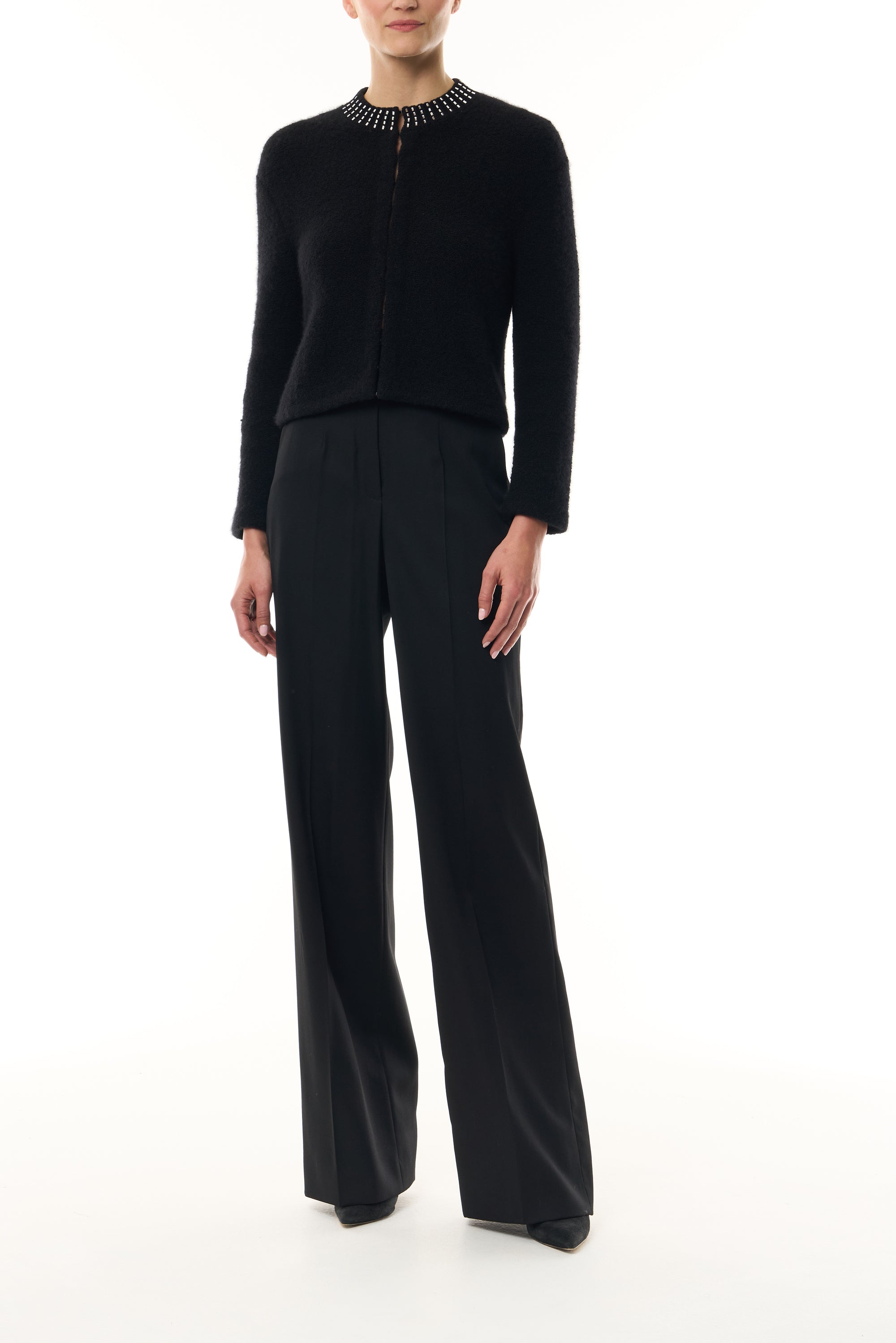 Monique Lhuillier Fall 2026 Noir bouclé knit jacket with crystal trim neckline and hook and eye closures - front.
