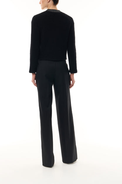 Monique Lhuillier Fall 2026 Noir bouclé knit jacket with crystal trim neckline and hook and eye closures - back.