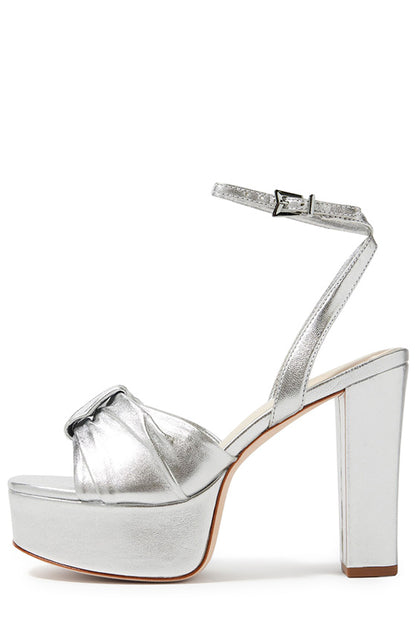 Monique Lhuillier silver leather Kris platform heel with knotted toe strap and silver hardware.