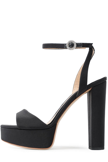 Khloe platform heel in black faille fabric with crystal buckle ankle strap - side.