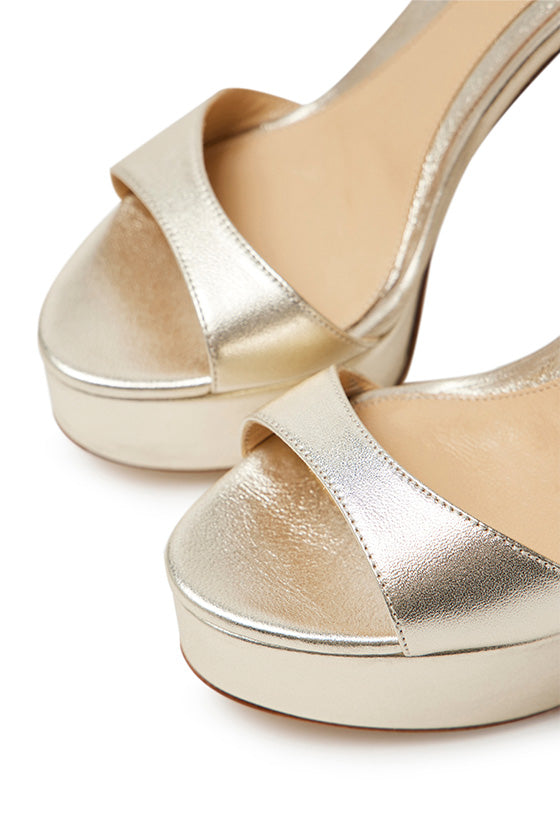 Monique Lhuillier Khloe platform heels in platinum leather.