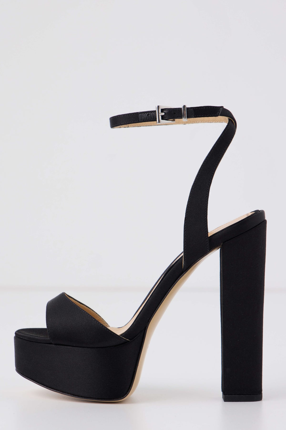 Khloe platform heel in black satin fabric with silver buckle ankle strap - side.