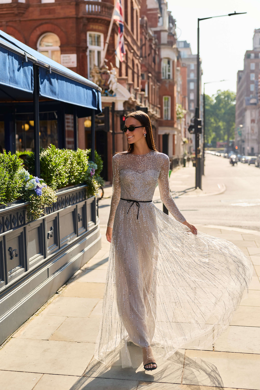 Monique Lhuillier Fall 2026 Silver Smoke long sleeve embroidered tulle gown with Noir velvet belt at waist- lookbook.