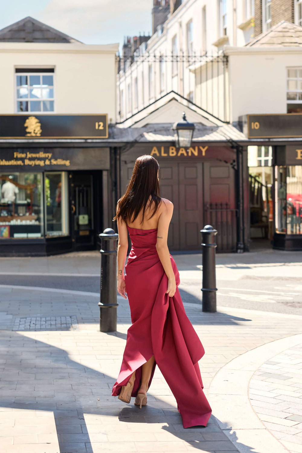 Monique Lhuillier Fall 2026 Rhubarb Silk Faille asymmetric strapless draped gown with train - lookbook.