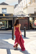Monique Lhuillier Fall 2026 Rhubarb Silk Faille asymmetric strapless draped gown with train - lookbook.