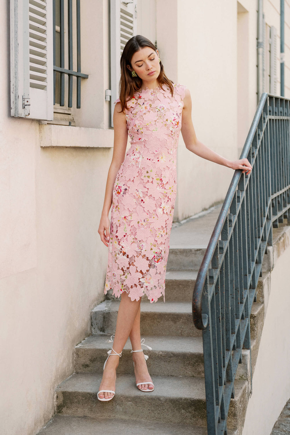 Monique Lhuillier Spring 2024 sleeveless, midi length dress in peony pink floral printed lace.