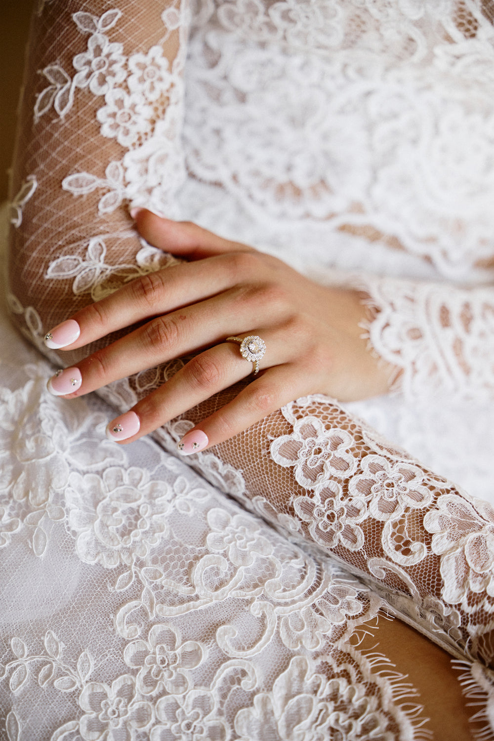 Melrose long sleeve bridal jacket in silk white lace - shown on model.