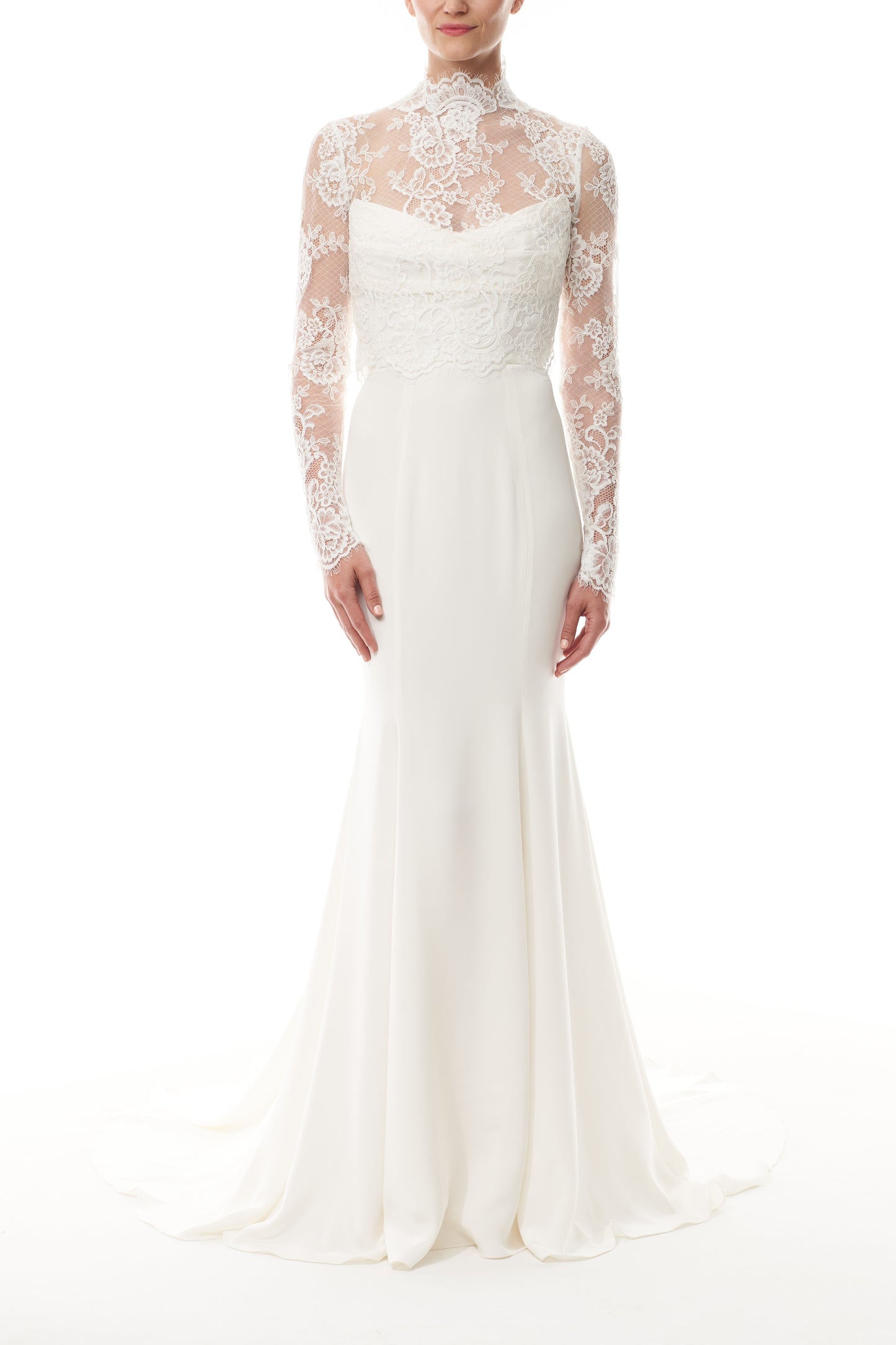 Silk white, long sleeve lace bridal jacket with high neck and hook eye closure at the back.  Shown over silk white satin gown - front.
