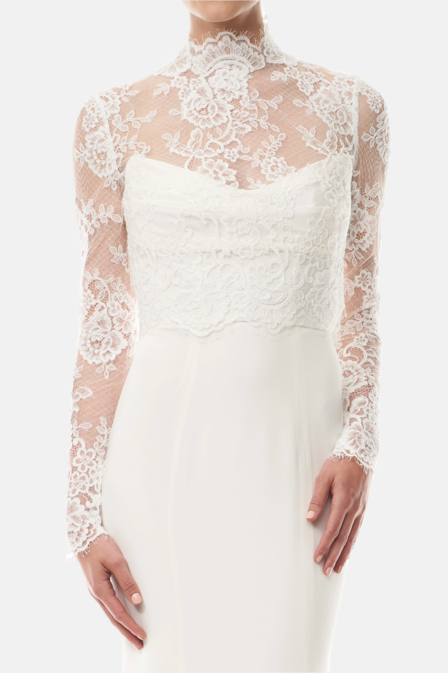 Silk white, long sleeve lace bridal jacket with high neck and hook eye closure at the back.  Shown over silk white satin gown - front crop.