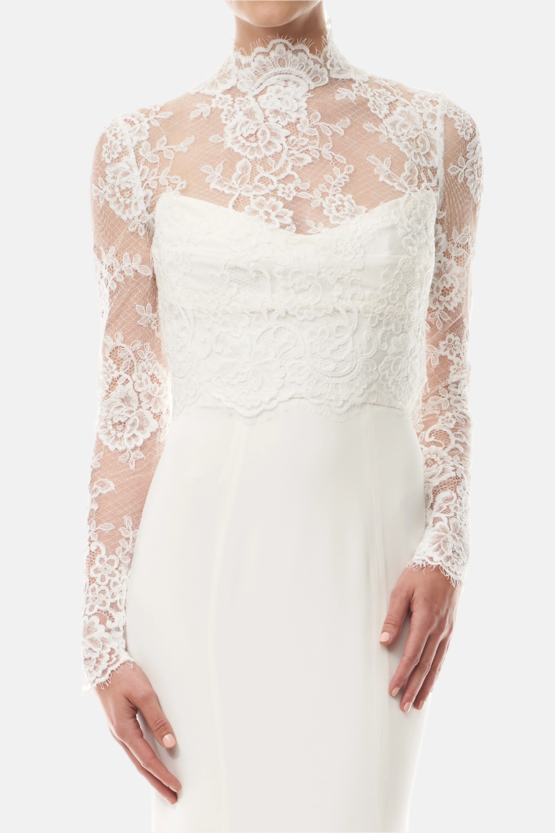 Silk white, long sleeve lace bridal jacket with high neck and hook eye closure at the back.  Shown over silk white satin gown - front crop.