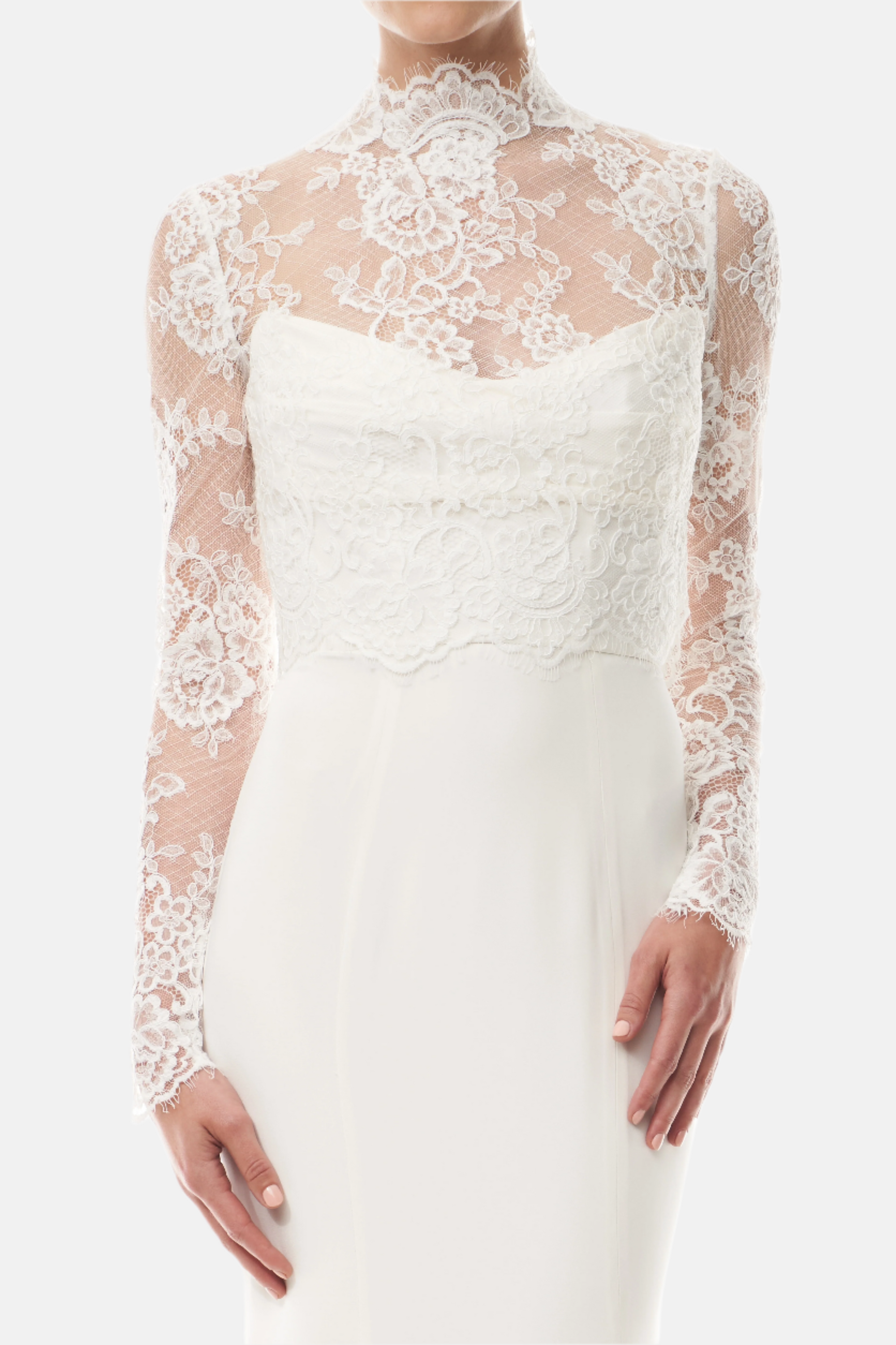 Silk white, long sleeve lace bridal jacket with high neck and hook eye closure at the back.  Shown over silk white satin gown - front crop.
