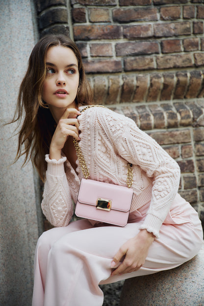 Monique Lhuillier Fall 2024 long sleeve, cropped bobble cardigan in Pale Blush wool cable knit - lookbook.