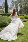 Woman wearing ivory lace off-the-shoulder a-line sweetheart Monique Lhuillier Spring 2021 Arabella ballgown