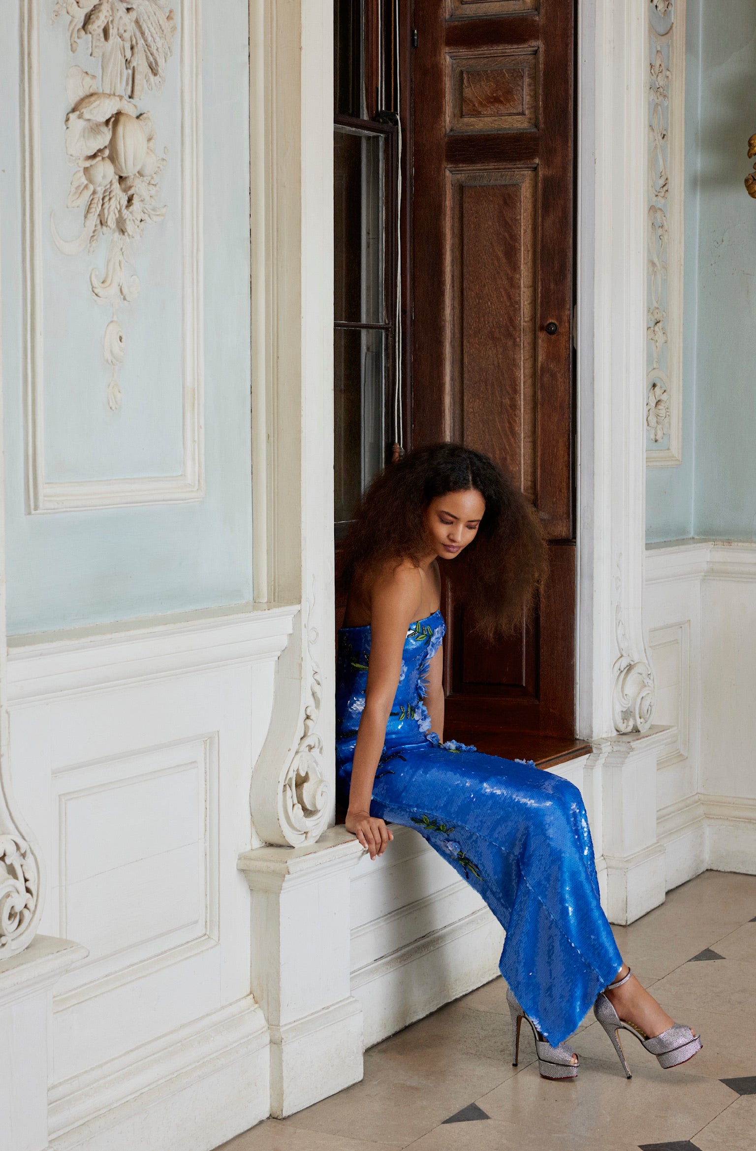 Monique Lhuillier Fall 2024 fitted, strapless column gown in Sky Blue sequin and Floral embroidery - lookbook photo.