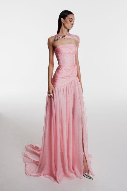 Monique Lhuillier Fall 2026 pink iridescent chiffon strapless asymmetric draped gown with scarf and floral embellishment- lookbook.