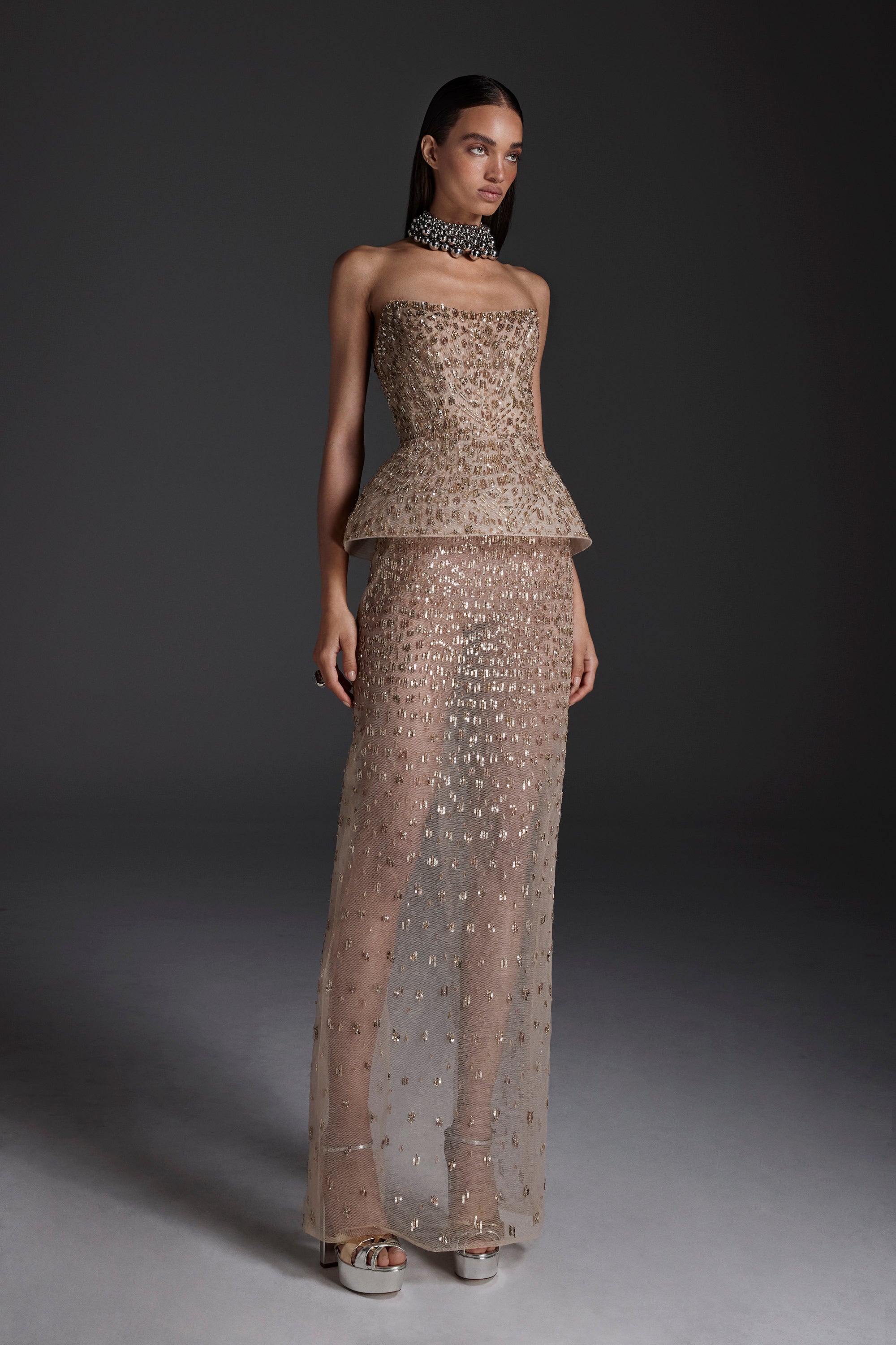 Monique Lhuillier Fall 2026 gold embroidered tulle strapless structured peplum column gown - lookbook.
