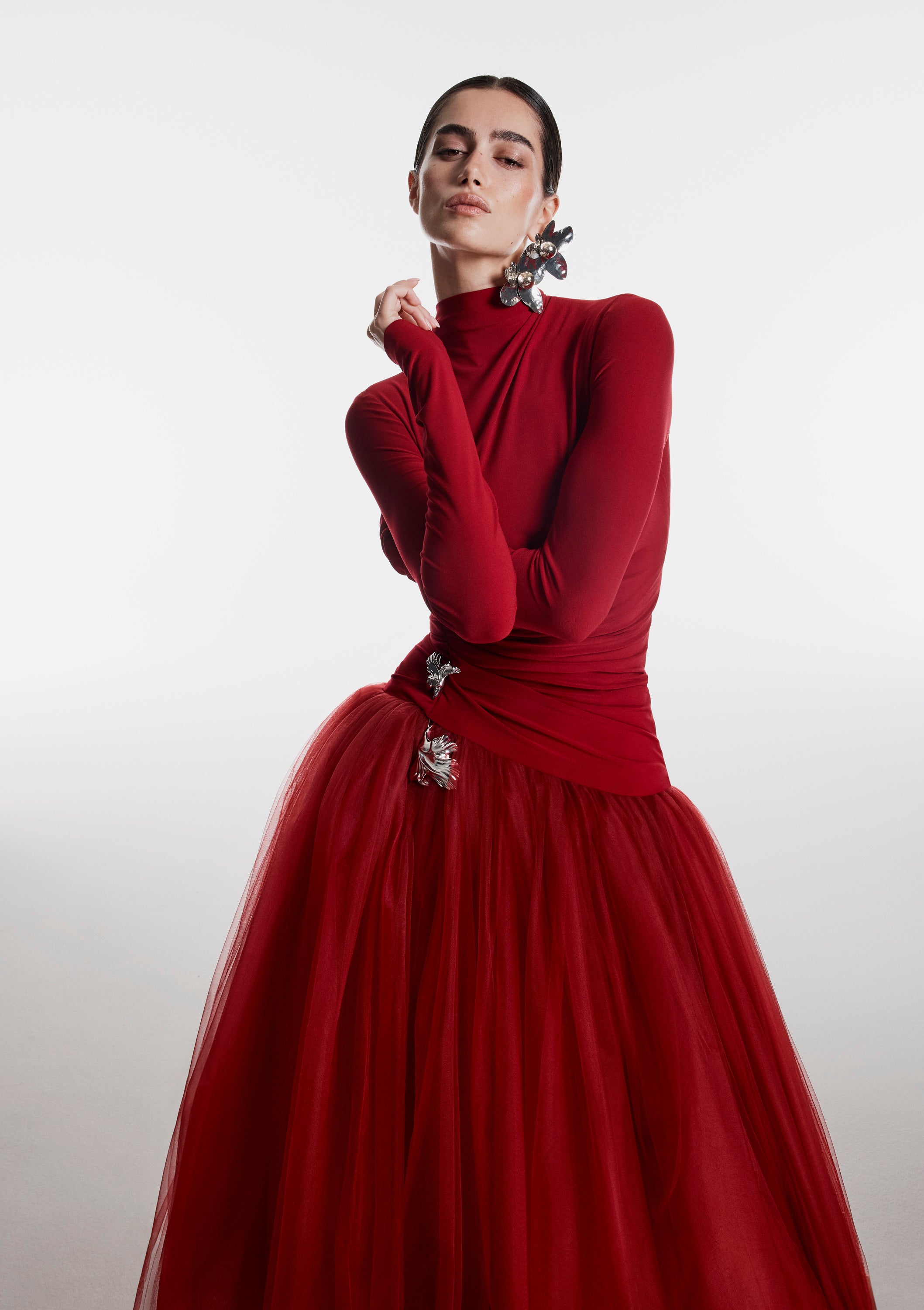 Monique Lhuillier Fall 2026 Rhubarb crepe jersey and tulle Long sleeve dropped
waist tea length gown with floral embellishment - lookbook.