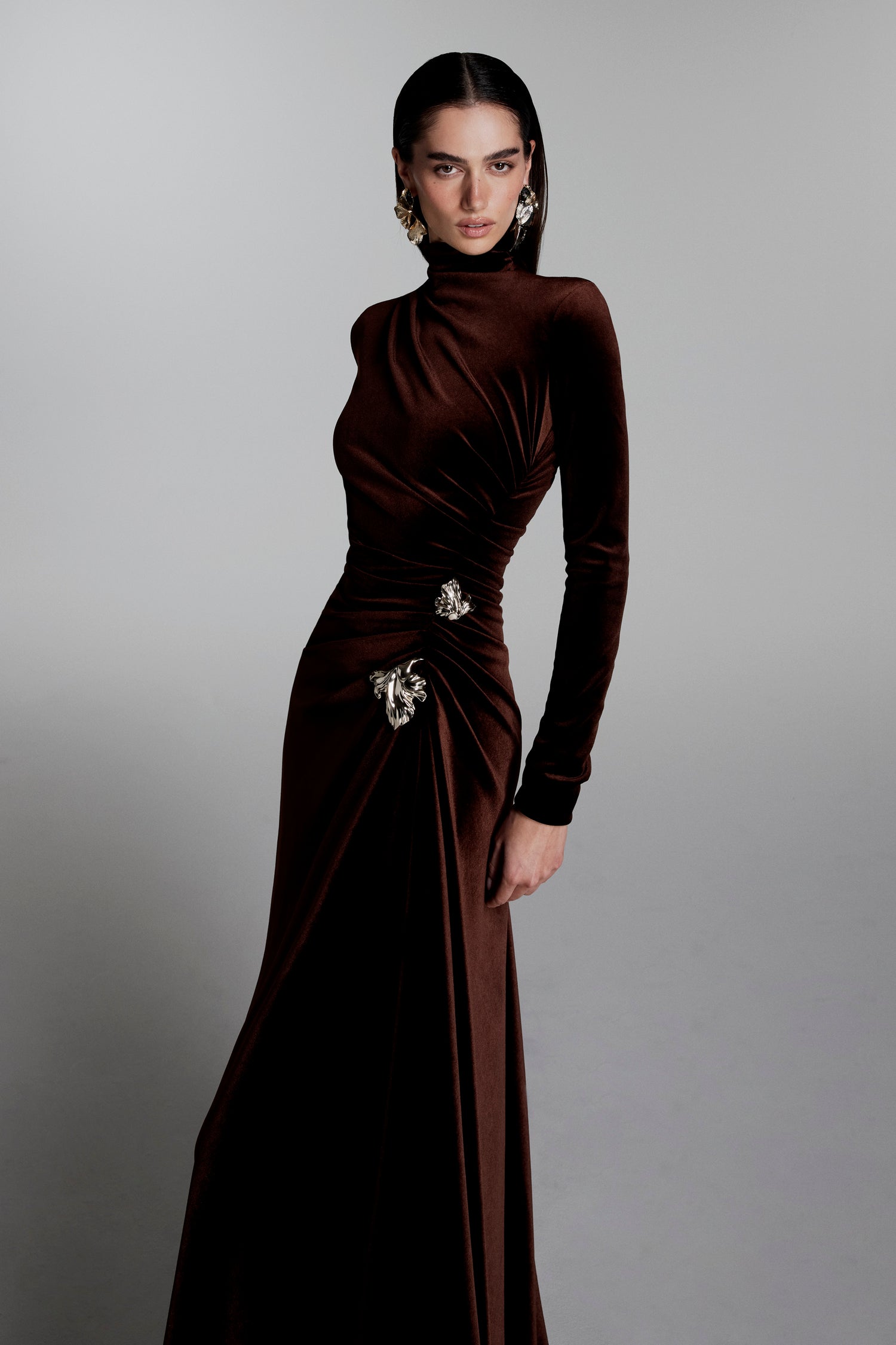 Monique Lhuillier Fall 2026 Cafe stretch velour high neck long sleeve gown with floral embellishment - lookbook.