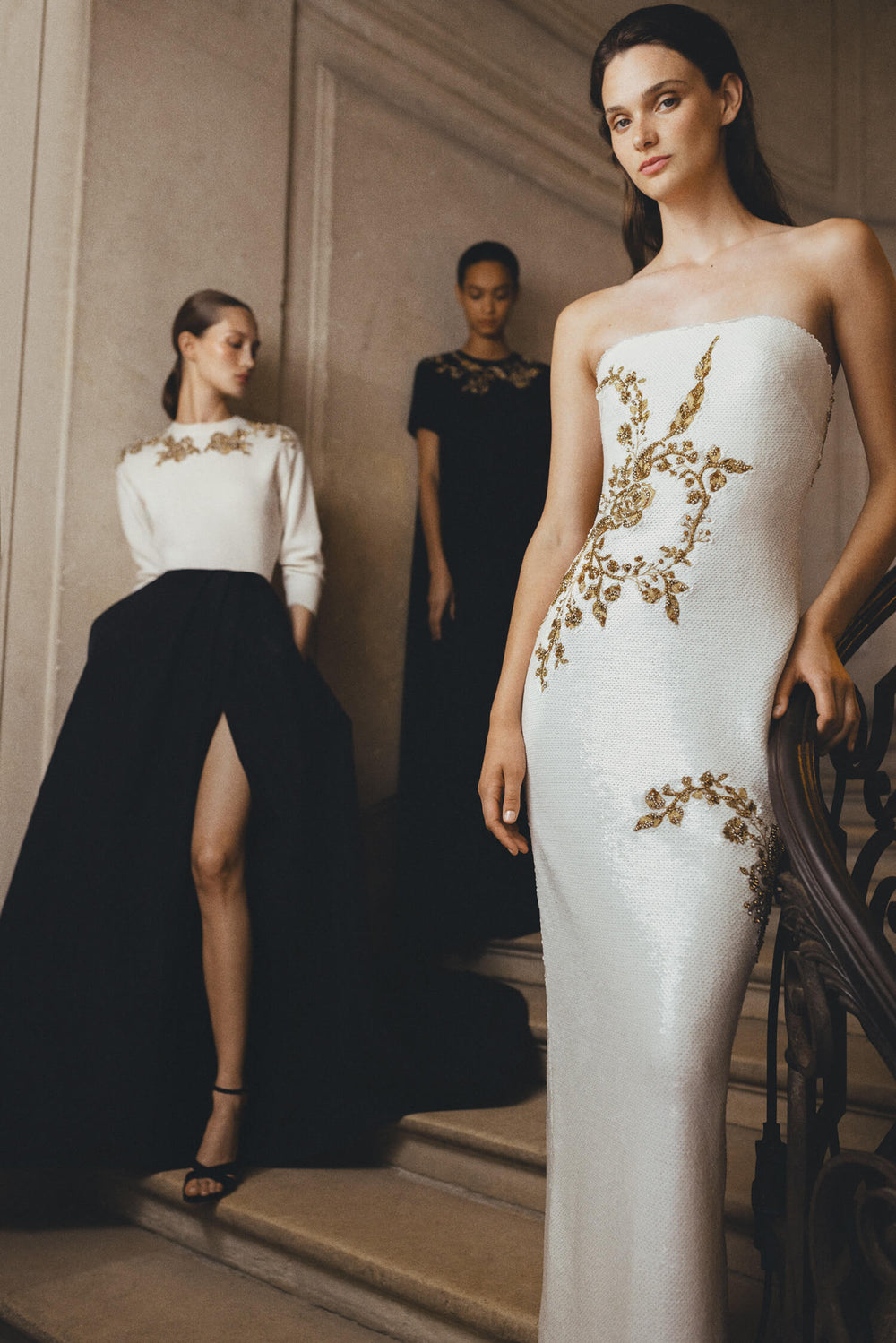 Monique Lhuillier Spring 2024 strapless sequin column gown in silk white sequins and gold embroidery.