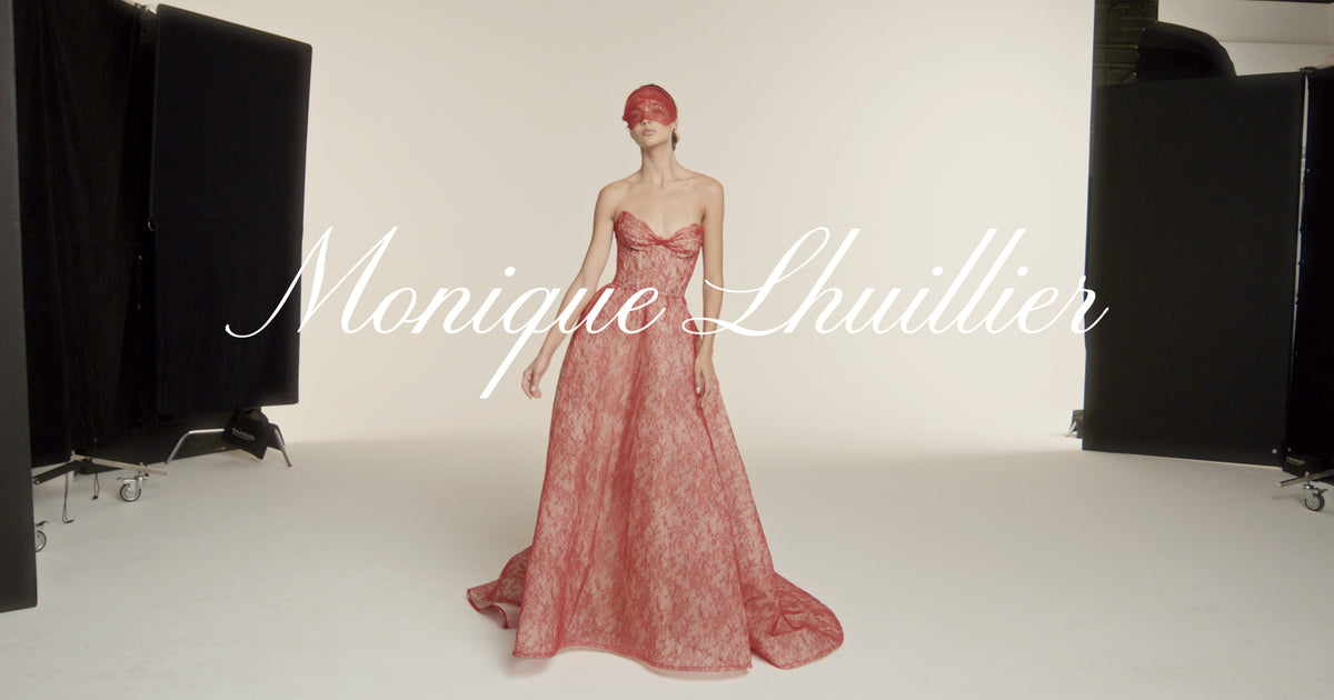 Monique Luillier Spring 2027 Bridal Strapless sweetheart Rouge ballgown in scarlet and nude Chantilly lace with head band with lace veilette.