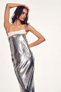 Monique Lhuillier Spring 2027 Silver/Silk White sequin strapless color blocked column gown with bow - lookbook.