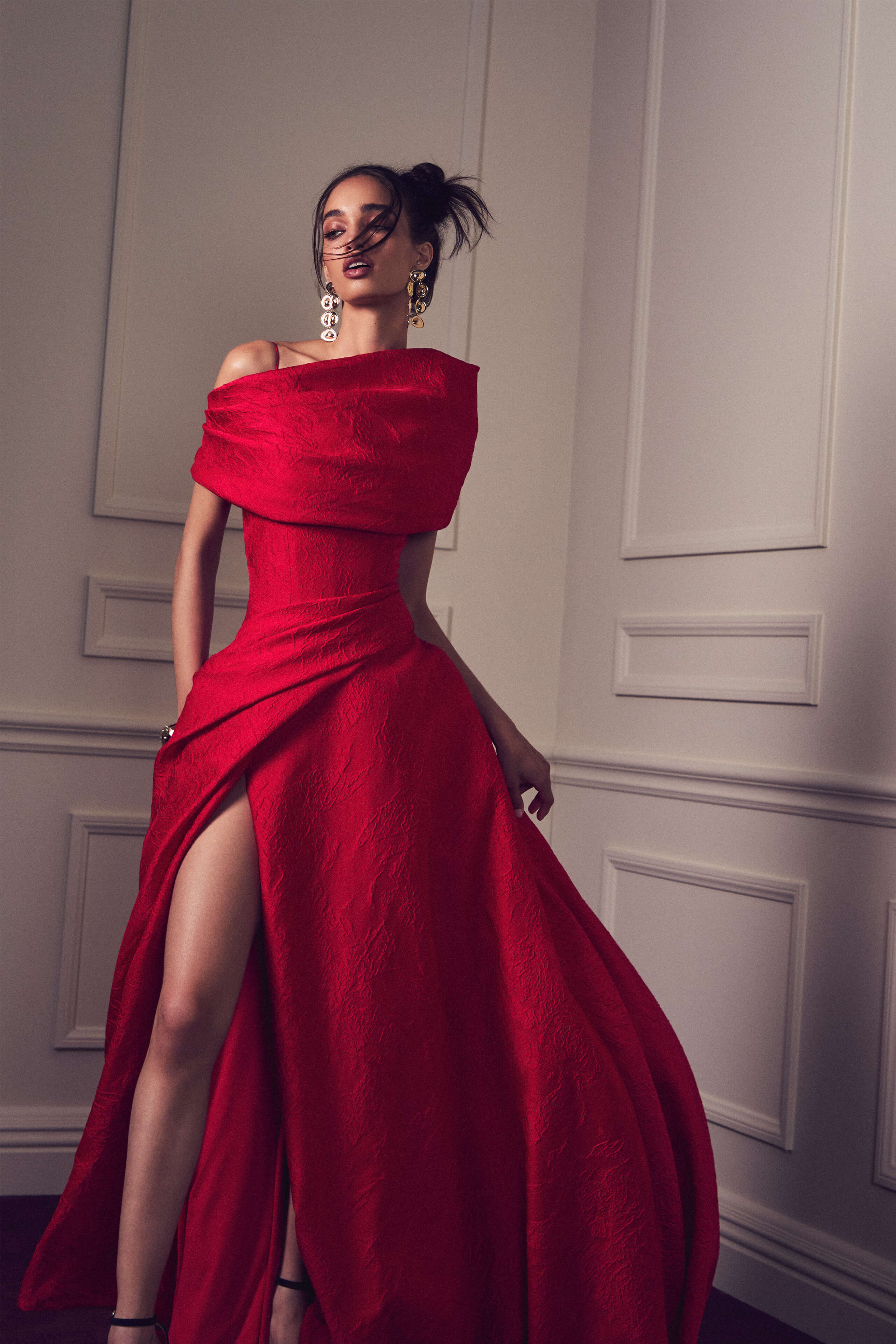 Monique Lhuillier Spring 2027 Strawberry Jacquard draped ball gown with front slit and draped wrap - lookbook.