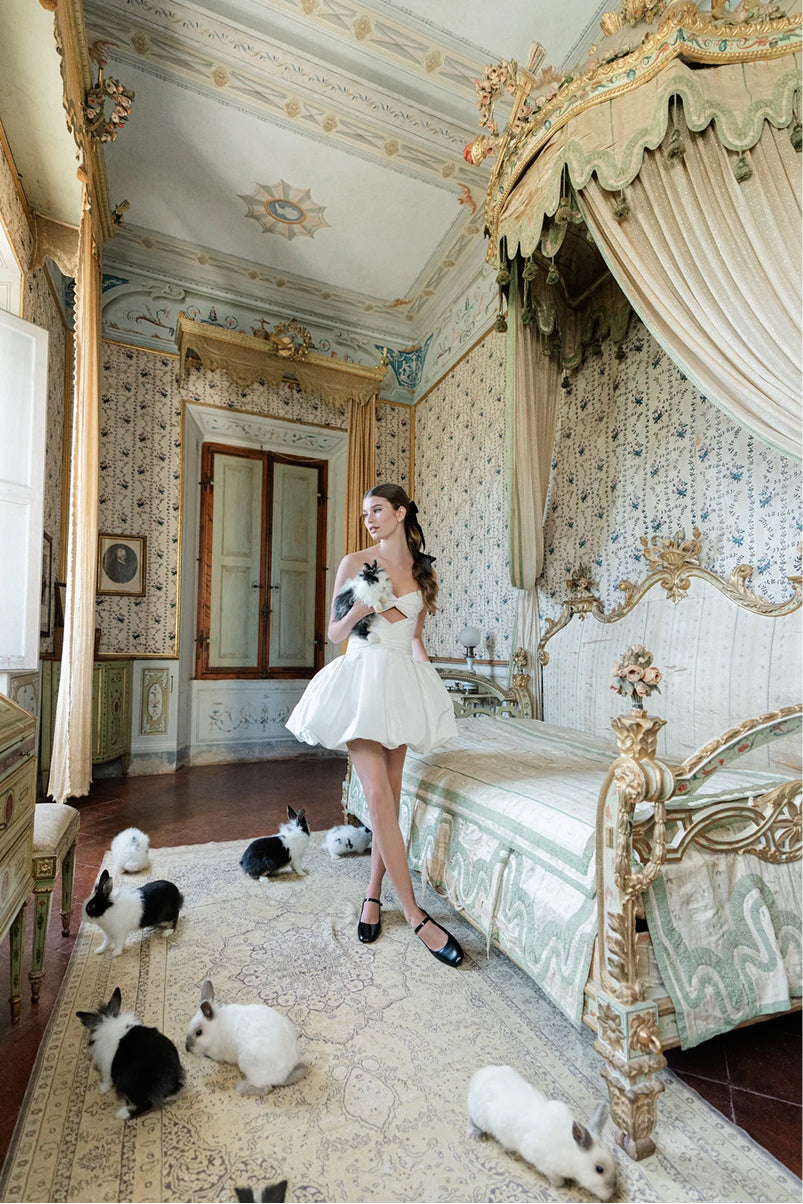 Monique Lhuillier 'Mon Cheri' strapless dress with keyhole, sweetheart bodice and tufted bubble skirt on model with rabbit - lookbook.