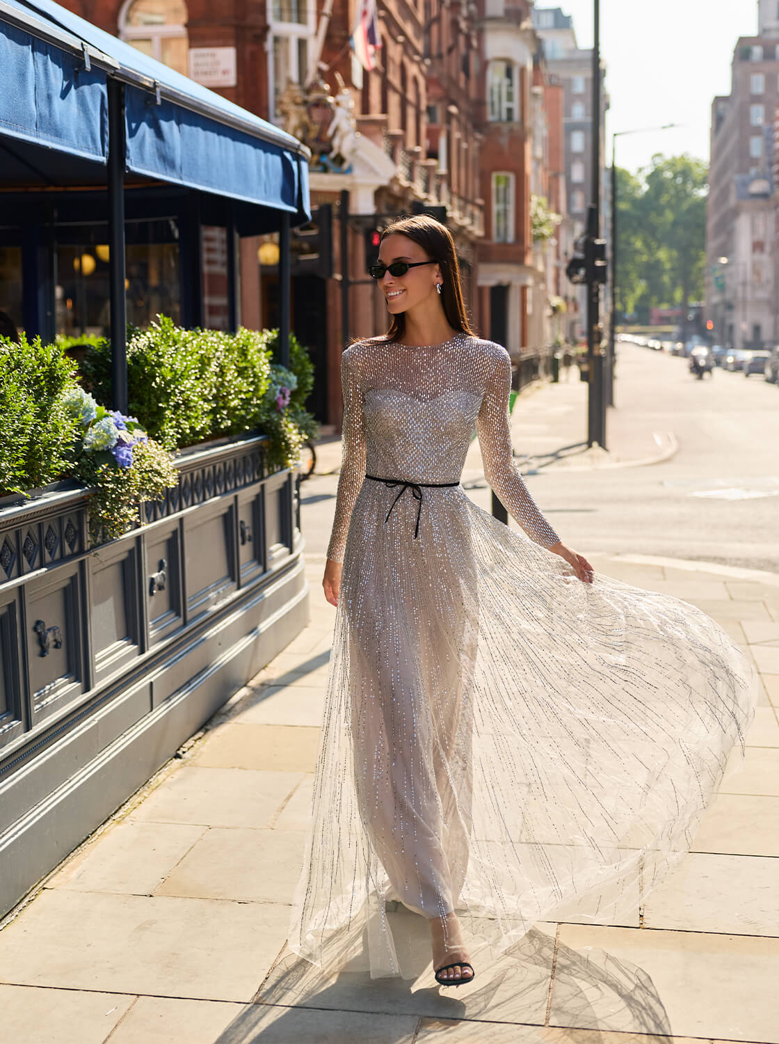 Monique Lhuillier Fall 2026 Silver Smoke long sleeve embroidered tulle gown with Noir velvet belt at waist- lookbook.