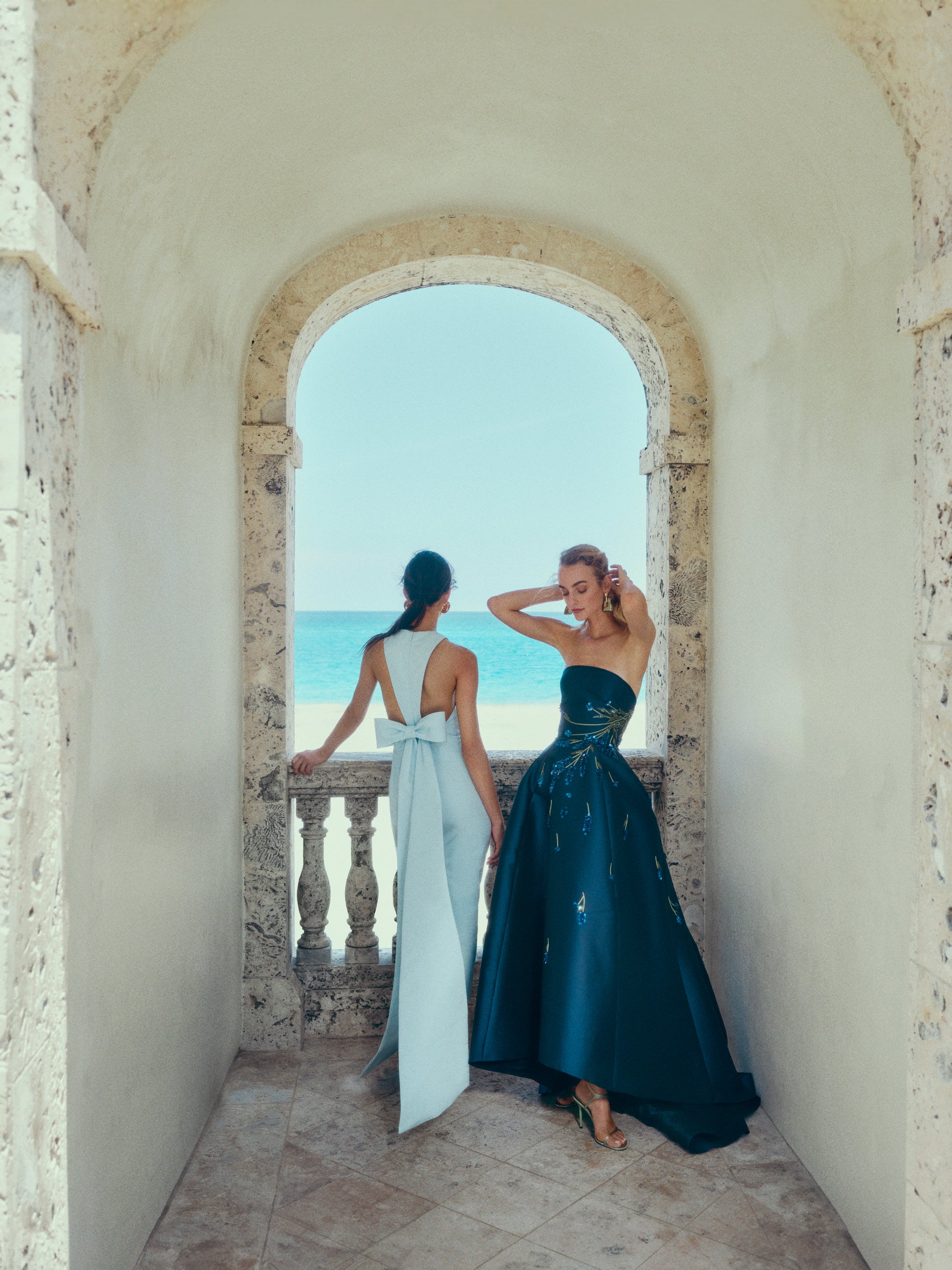 Monique Lhuillier Spring 2025 Strapless ball gown with high-low hemline and pockets in Lapis Mikado/Lavender embroidery - lookbook.