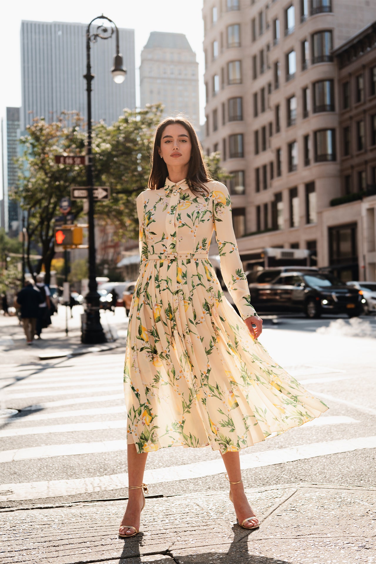 Monique Lhuillier Spring 2025 long sleeve pleated button-down dress with belt at waist in lemon printed georgette fabric - lookbook.