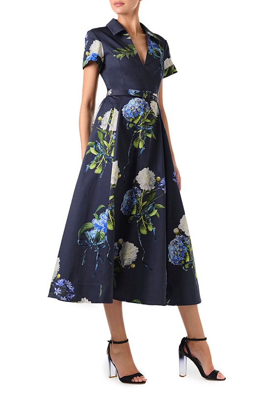 Monique Lhuillier Fall 2024 night sky floral collared, short sleeve dress with pockets, belted waist and midi a-line skirt - right side.