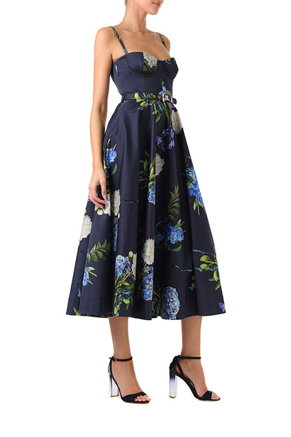 Monique Lhuillier Fall 2024 blue floral spaghetti strap, a-line midi dress with corseted bodice, pockets and belted waist - right side.