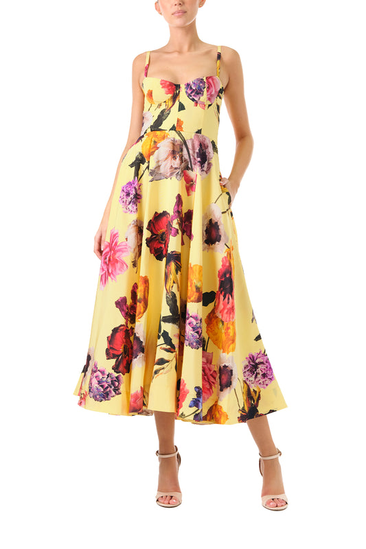 Monique Lhuillier Fall 2024 spaghetti strap, A-line cocktail dress with corseted bodice in yellow floral printed silk faille - front.