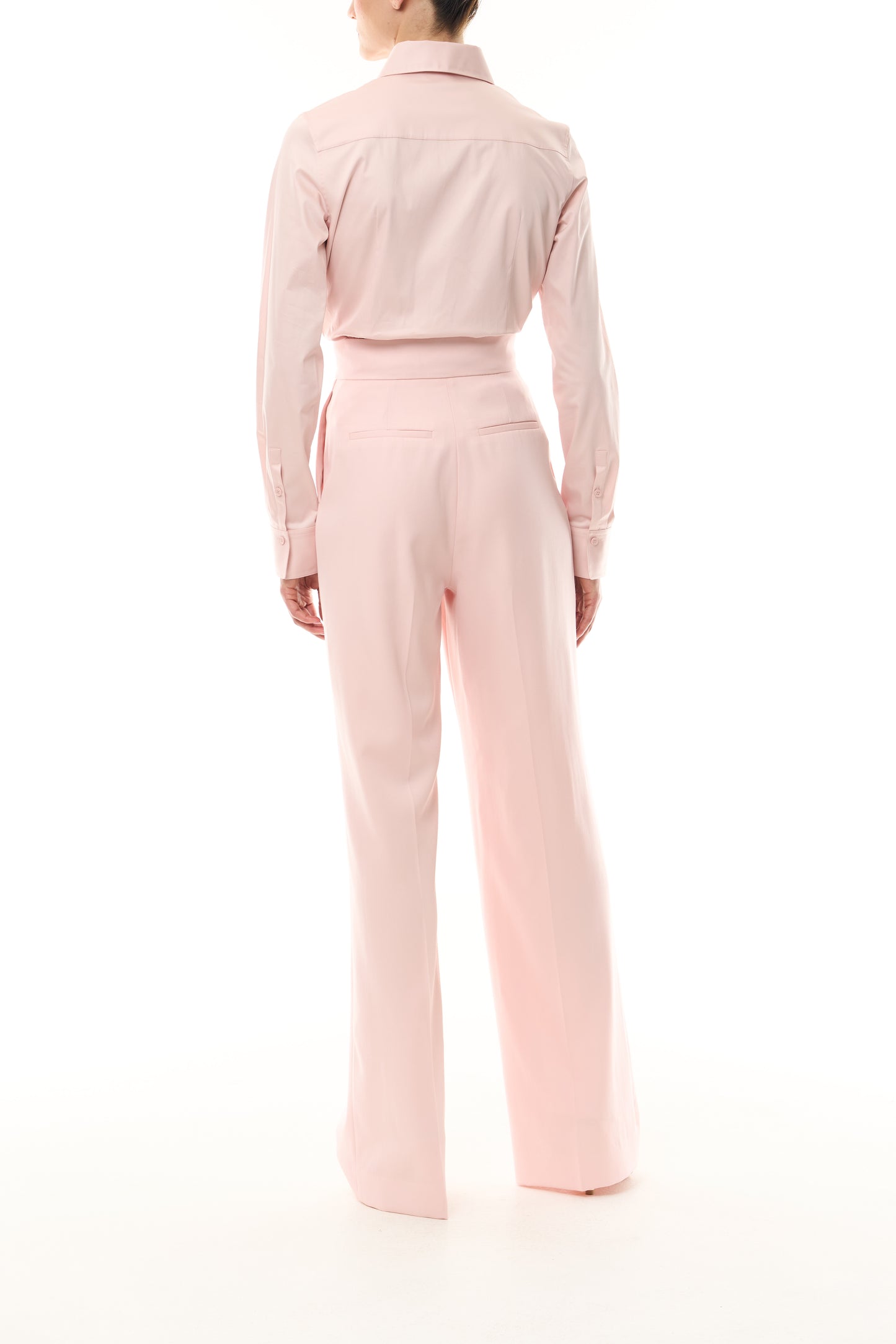 Monique Lhuillier Fall 2024 Pale Blush Cottin Poplin Tuxedo Blouse and Wool Suiting Straight leg trouser - back.