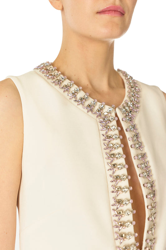 Monique Lhuillier Spring 2025 Sleeveless shift dress with jeweled neckline in Silk White wool/silk suiting - jeweled neckline detail.