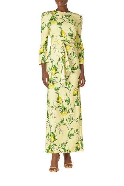 Monique Lhuillier Spring 2025 Lemon printed crepe sheath dress with jewel neckline, self-tie sash and bracelet-length long sleeves - front.