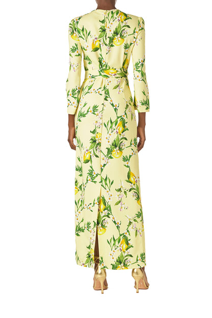 Monique Lhuillier Spring 2025 Lemon printed crepe sheath dress with jewel neckline, self-tie sash and bracelet-length long sleeves - back.
