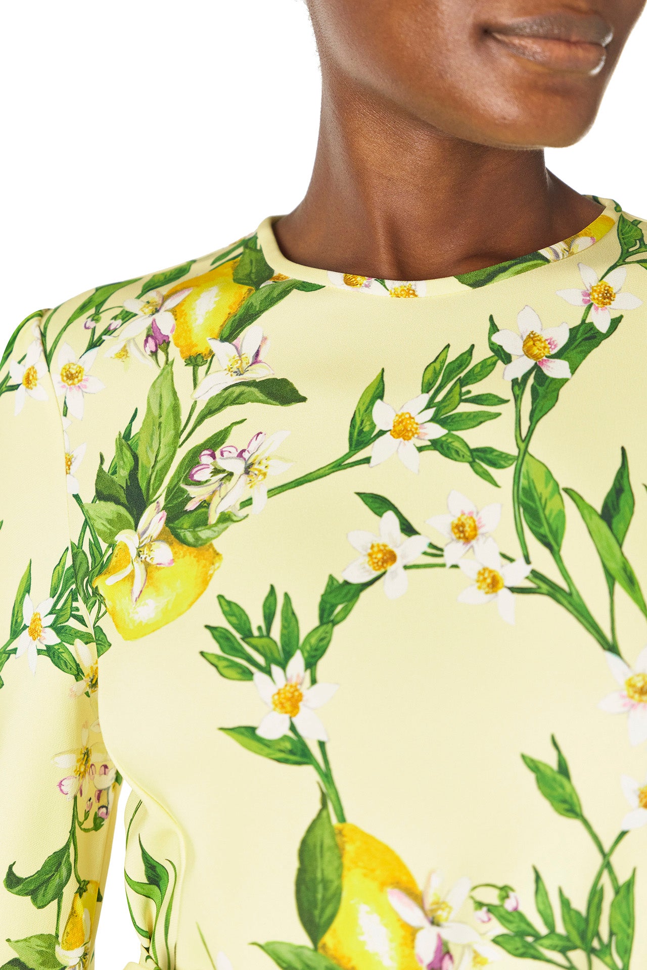 Monique Lhuillier Spring 2025 Lemon printed crepe sheath dress with jewel neckline, self-tie sash and bracelet-length long sleeves - fabric.
