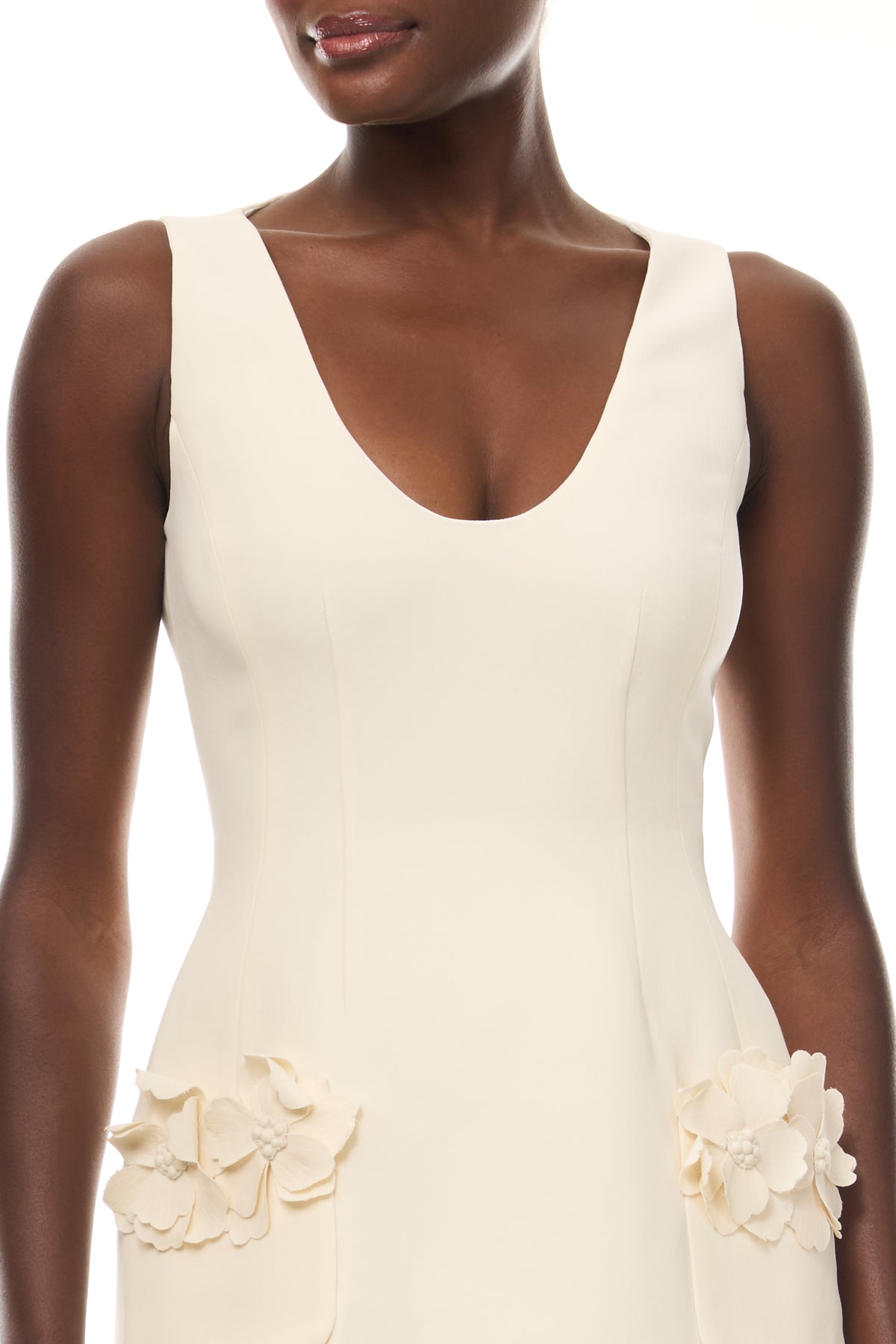 Monique Lhuillier Spring 2026 Ivory Lighweight Silk Wool Suiting Scoop neck dress with floral pockets - fabric.
