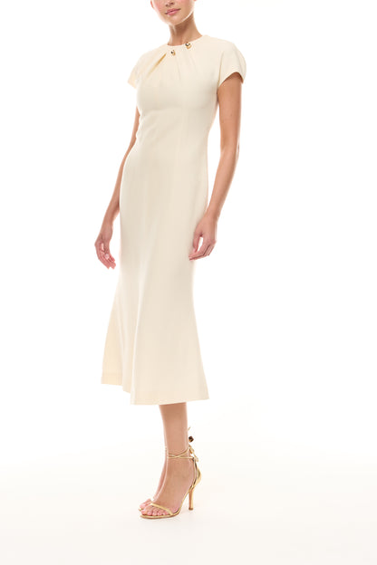 Monique Lhuillier Spring 2026 Ivory Lightweight Silk Wool Suiting Draped neckline dress with gold ball piercing - side.