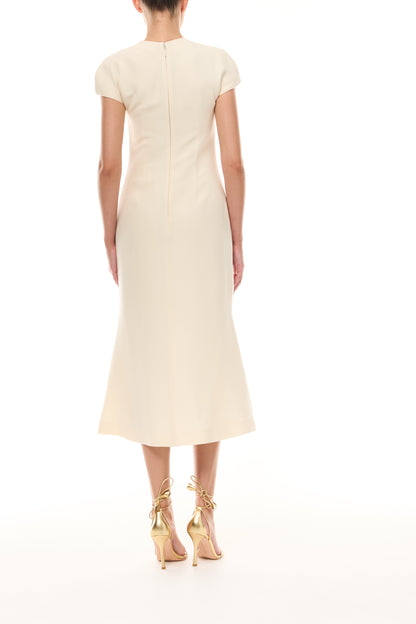 Monique Lhuillier Spring 2026 Ivory Lightweight Silk Wool Suiting Draped neckline dress with gold ball piercing - back.