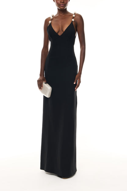 Monique Lhuillier Spring 2026 Noir Lightweight Silk Wool Suiting A - line V -neck gown with pearl ball straps - front with Crystal Dust Dasha Minaudière
