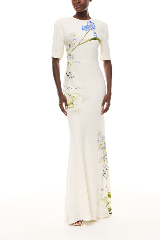 Monique Lhuillier Spring 2026 Ivory/Multi Iris Bouquet Printed CrepeShort sleeve bias gown -  front.