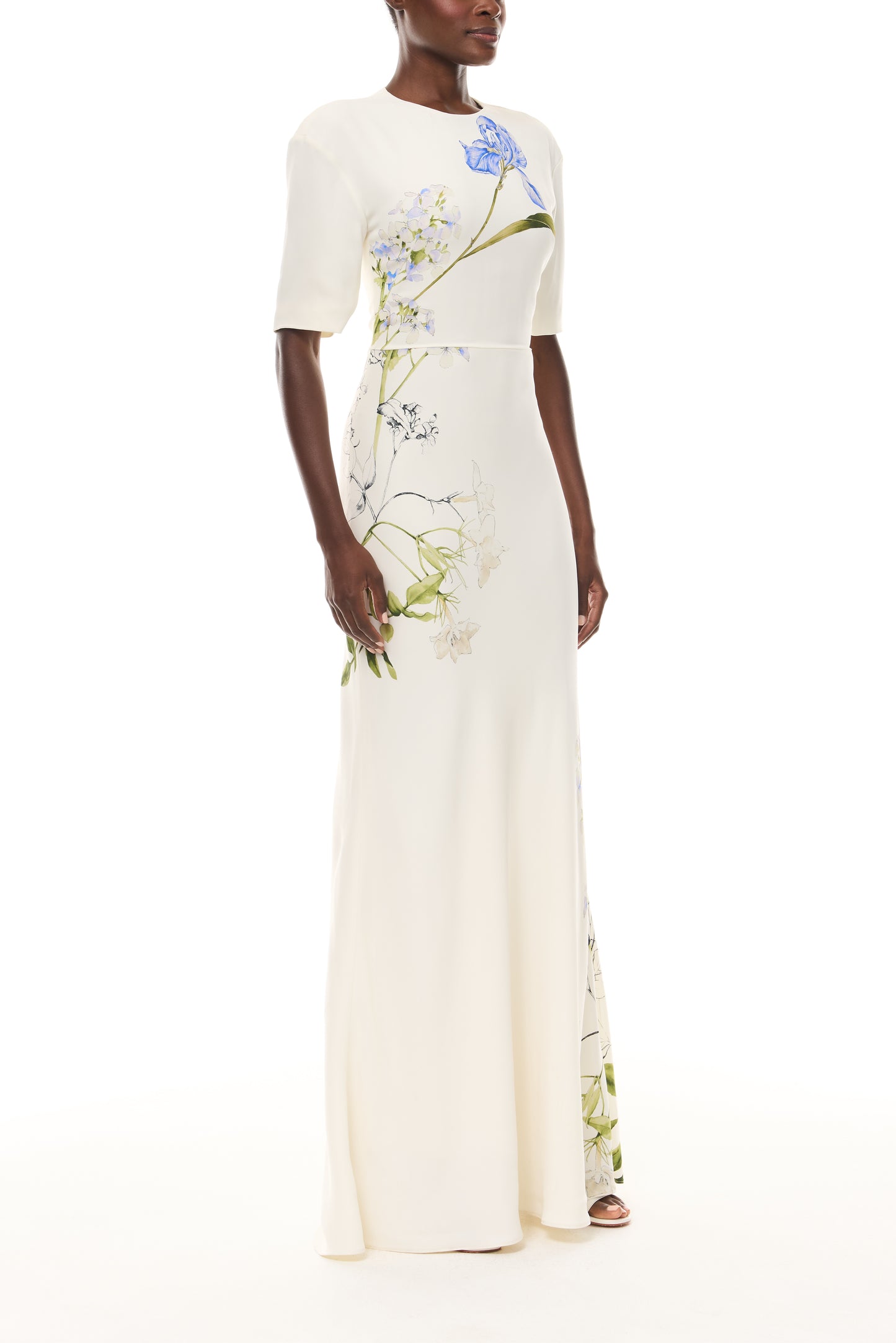 Monique Lhuillier Spring 2026 Ivory/Multi Iris Bouquet Printed CrepeShort sleeve bias gown - side.