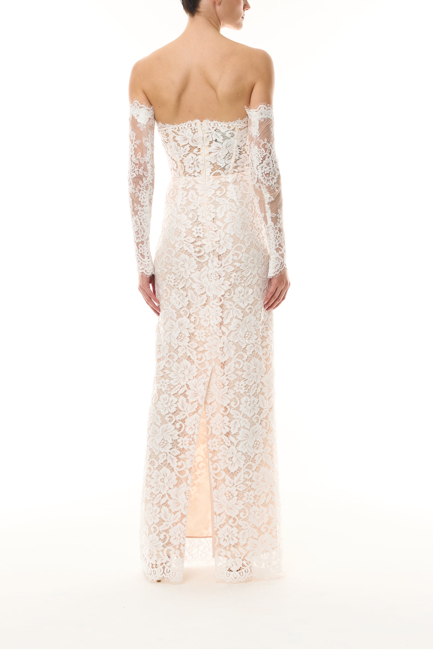 Monique Lhuillier Fall 2026  Silk White Peony Lace strapless column gown with lace Sloane sleeves -back.