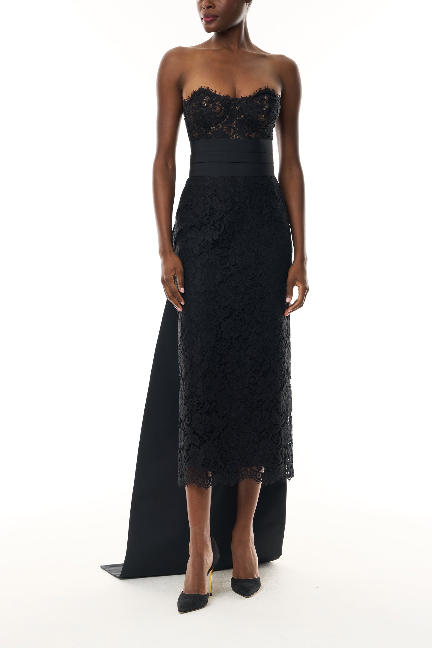 Monique Lhuillier Fall 2026 Strapless Midi Cocktail Dress in Noir Peony lace with Noir Silk Faille sash and train - front.